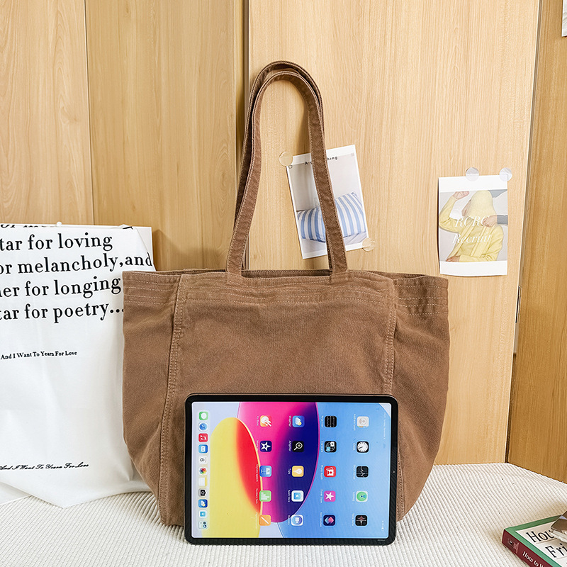 Bolso tote de lona de color sólido retro de gran capacidad de viento perezoso 2025 nuevo bolso de hombro simple de moda al por mayor