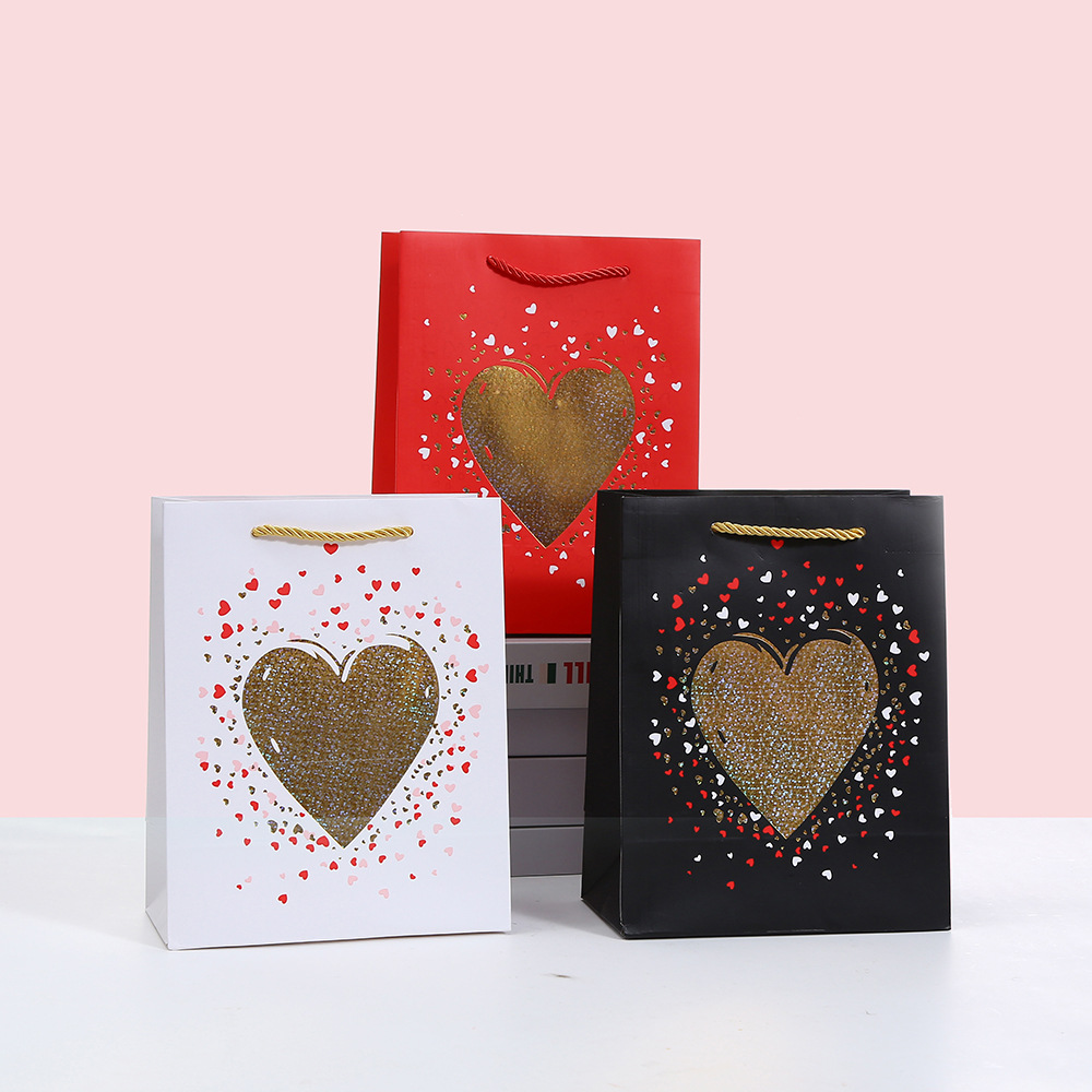 卡通印花包装袋白卡购物礼品袋批发520礼物手提袋爱心烫金购物袋