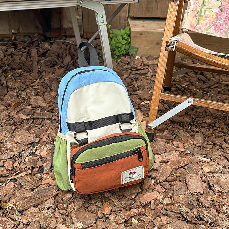 Mochila escolar para niños y niñas, mochila de hombro para bebés 2025, nueva moda al aire libre mochila infantil a prueba de rociamientos