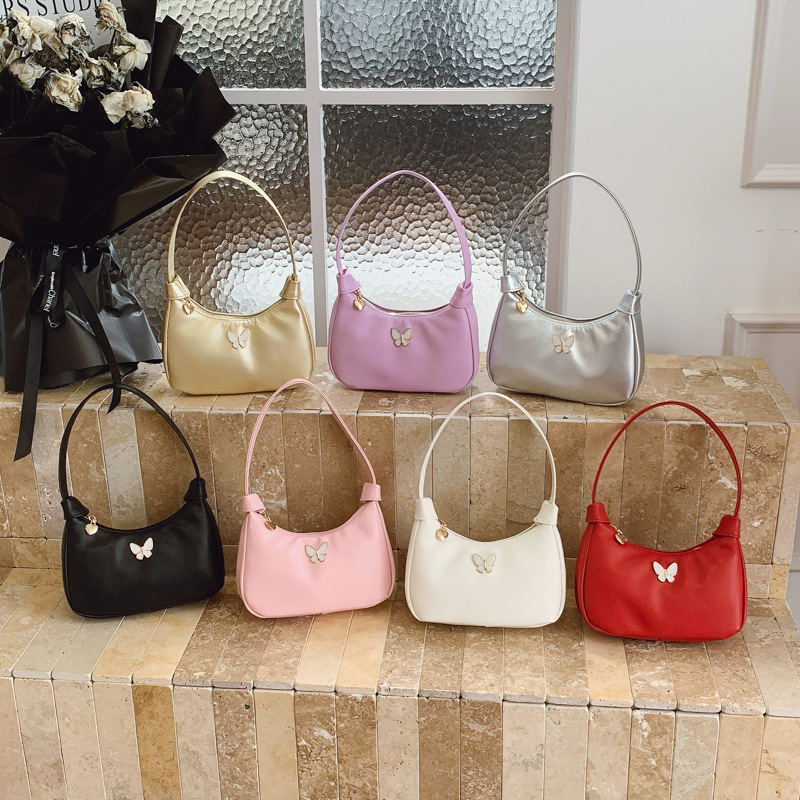 Coreana simple color sólido bolso de hombro para niños y niñas, pequeño y exquisito bolso de mano para bebés mariposa 2026 nuevo bolso para niños