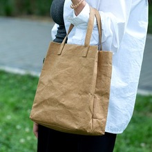 日式可水洗牛皮纸包简约女包文艺ipad包手提包饭盒袋子手腕包