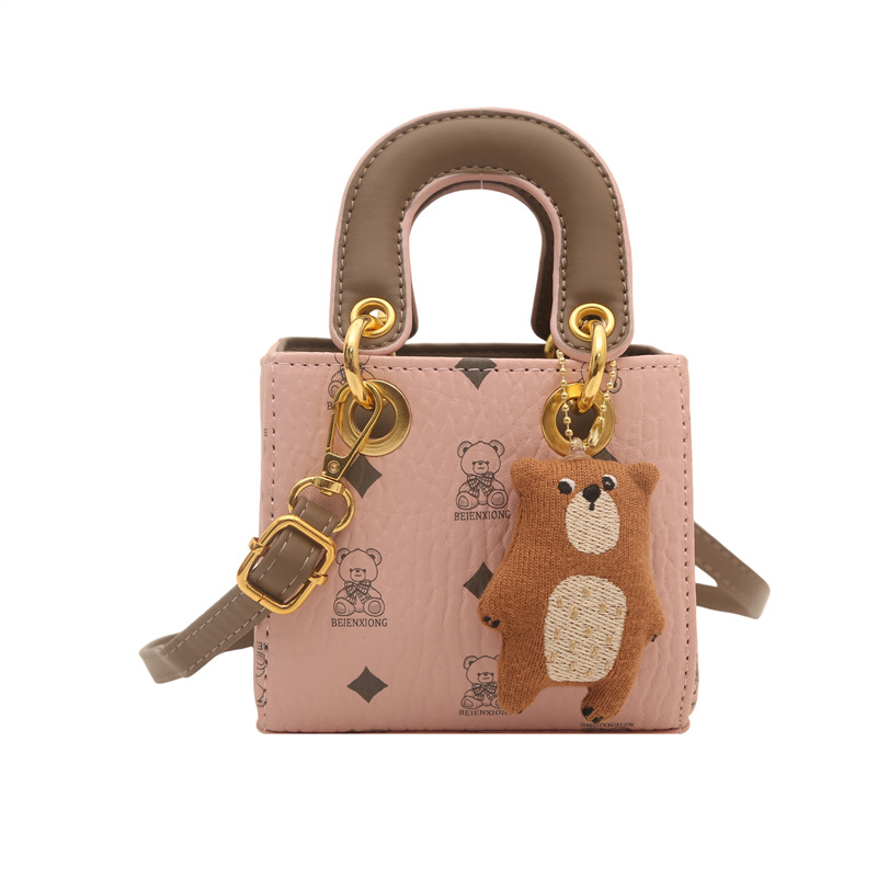 2026 nuevo bolso infantil caricatura lindo oso impresión bolso de hombro de moda mini bolso de bebé