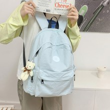 日系简约纯色双肩包轻便通勤大容量学生书包休闲百搭户外旅行背包