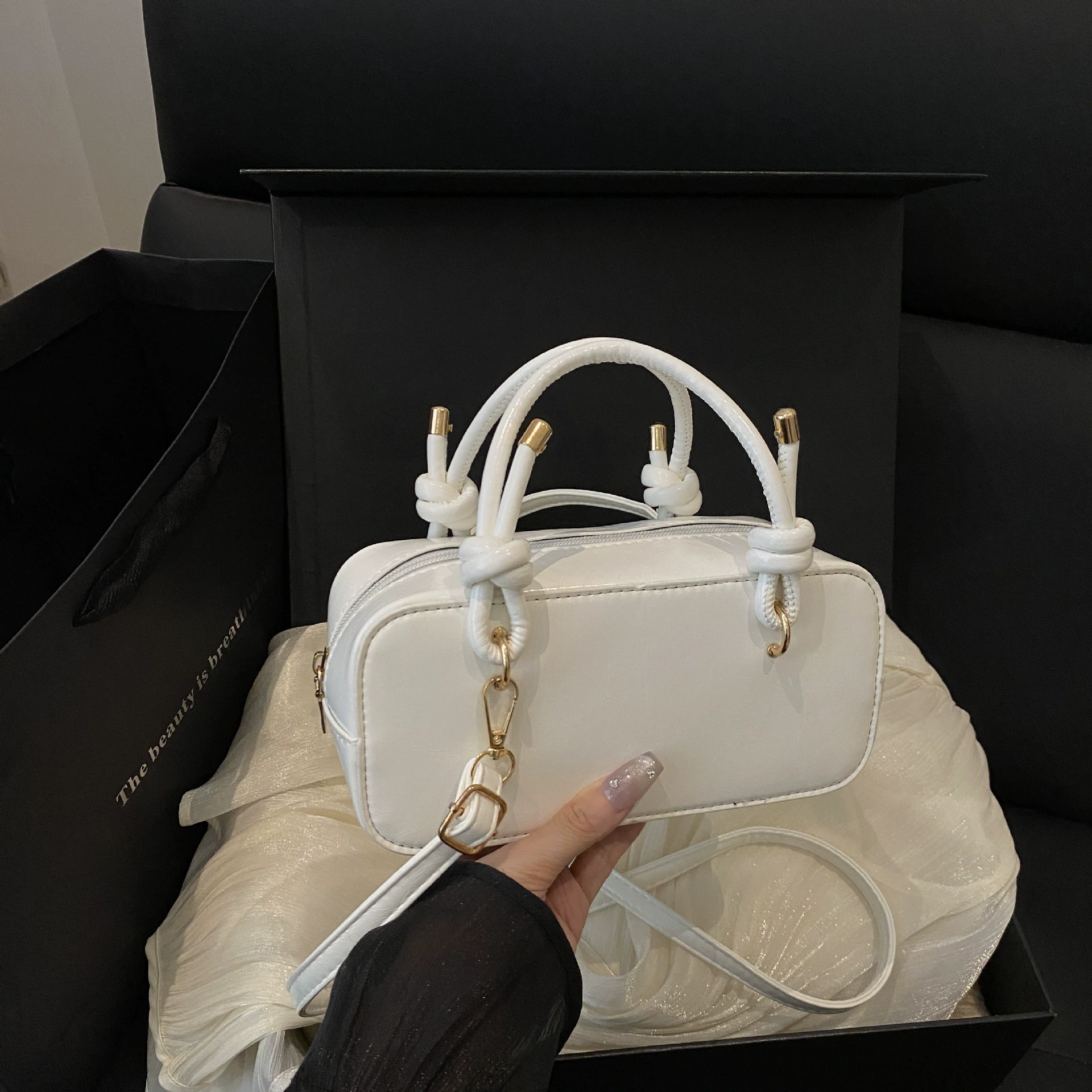Capacious cream one-shoulder bag for leisure