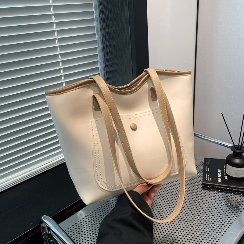 Bolsa de gran capacidad para mujeres 2025, nueva bolsa de hombro simple, sensación de relajación, bolsa de brazo, bolso de viaje, bolso de empalme de color