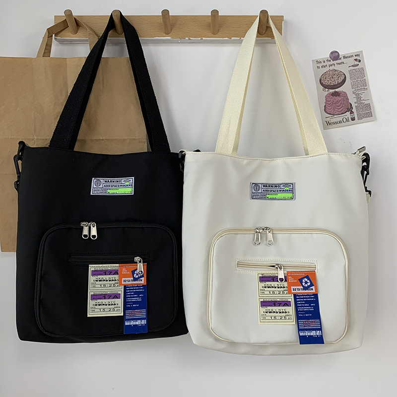 Nueva crossbody bolsa de lona de las mujeres de hombro de gran capacidad portátil estudiante moda nylon bolsa de lona bolsa de viaje bolsa