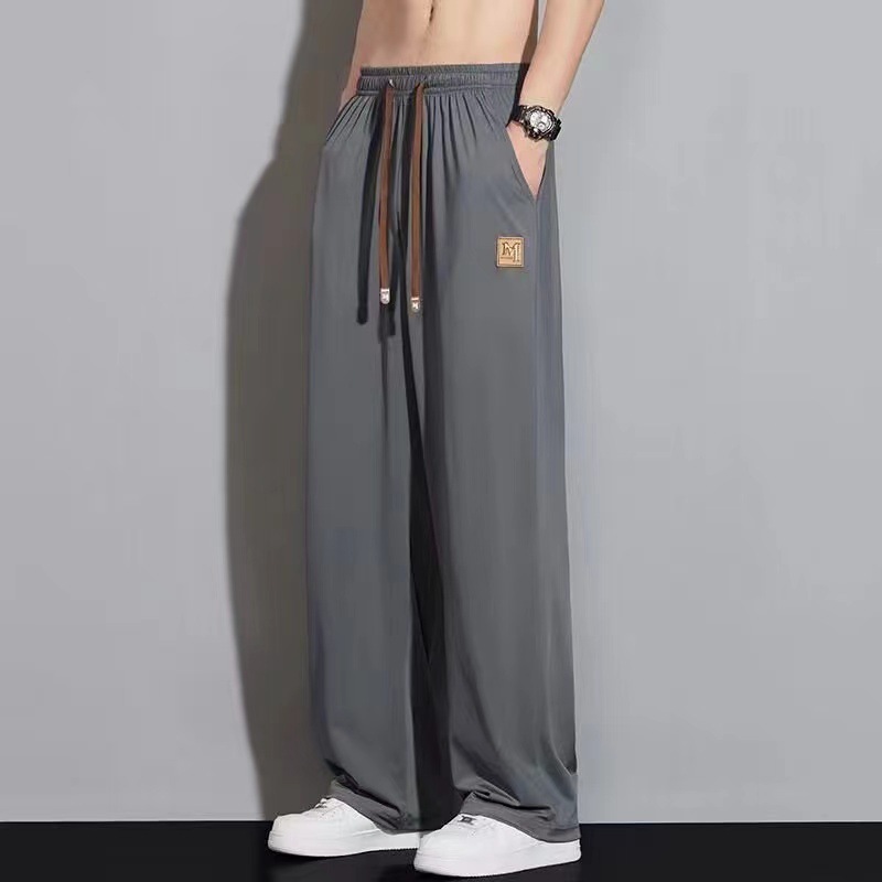 2026 nuevos pantalones casuales sueltos para hombres de moda coreana pantalones versátiles de verano delgados pantalones de piernas anchas