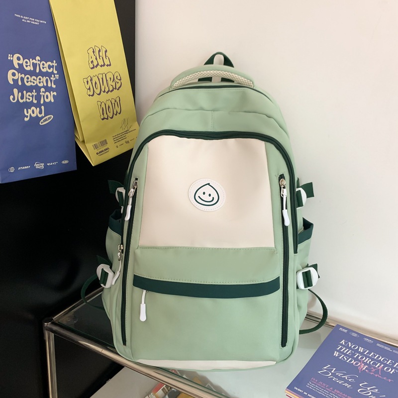 Mochila de lona coreana simple y versátil para mujeres 2023 nueva bolsa de gota de lluvia de gran capacidad mochila de ocio mochila de estudiantes