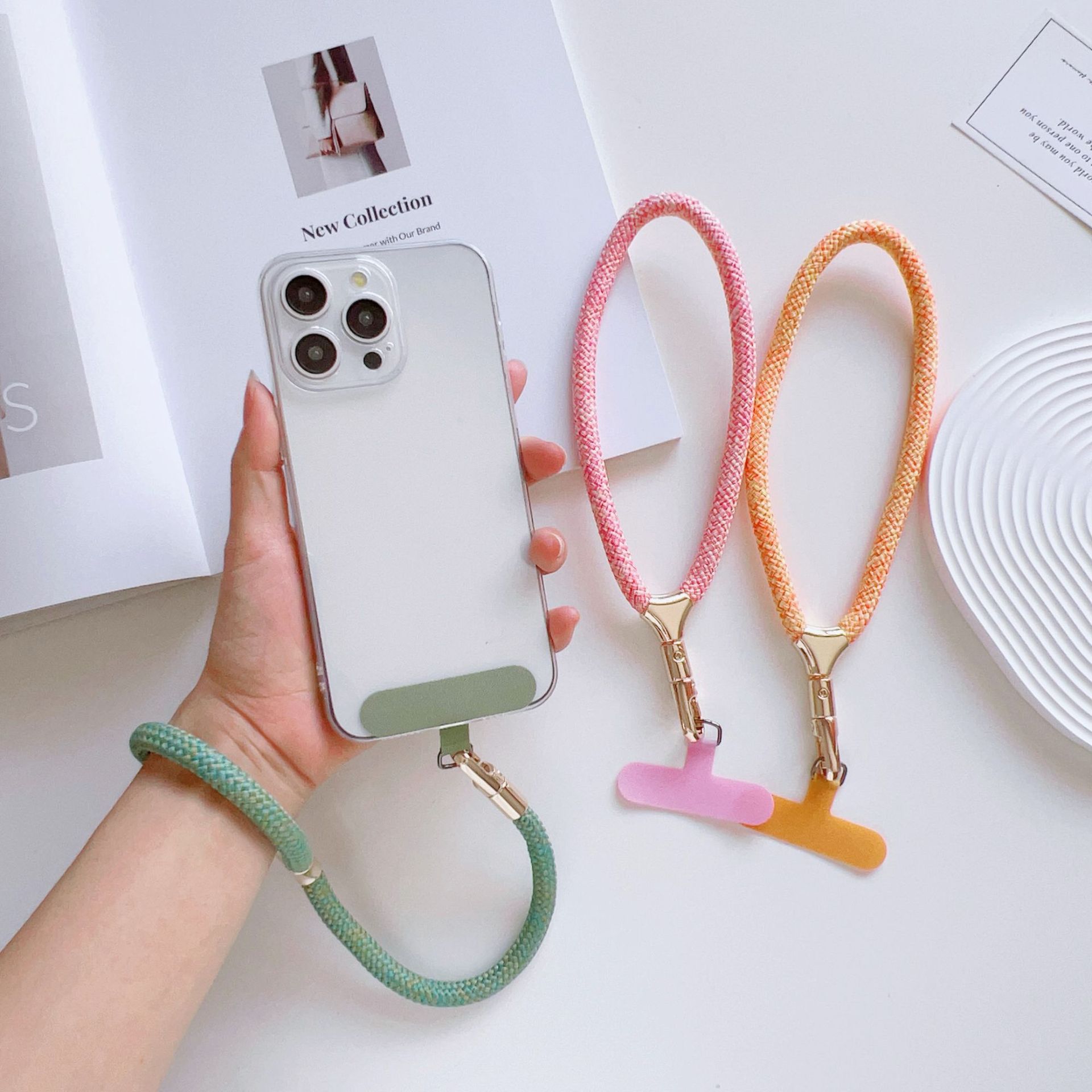 Cuerdas de muñeca ajustables de alta calidad con clips de hebilla pequeñas y frescas de poliéster corto para colgar teléfonos móviles simples y versátiles