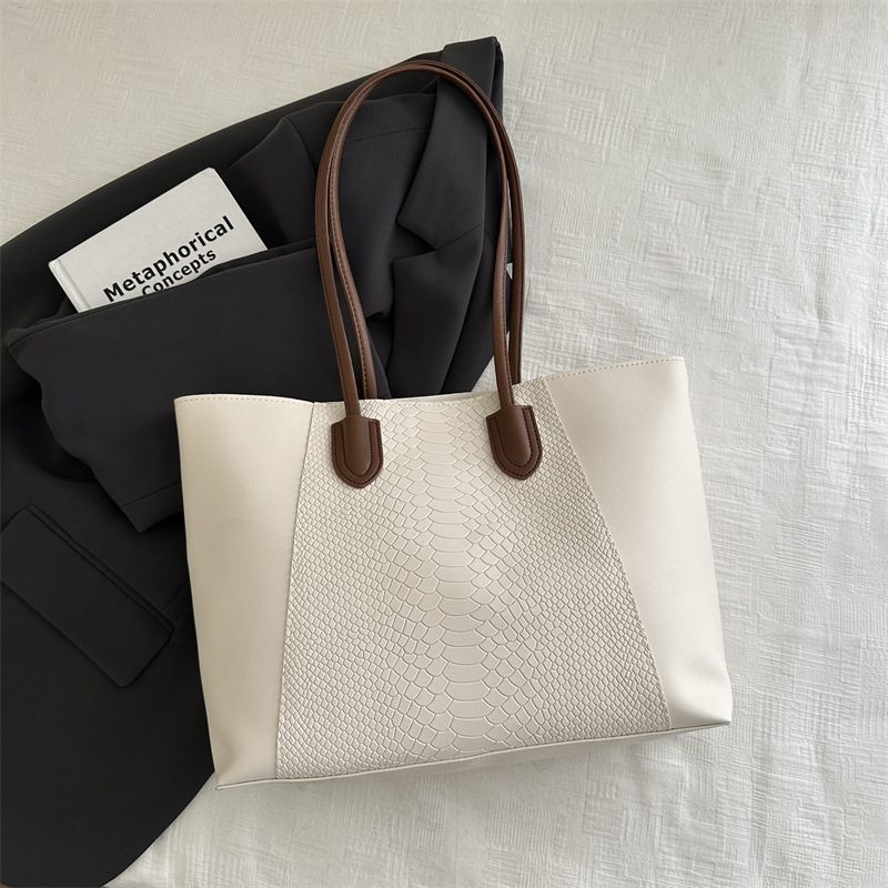 Bolso de viaje de temperamento simple para mujer 2025 Bolso de axilas de un solo hombro de gran capacidad de primavera Bolso de tote con estampado de cocodrilo