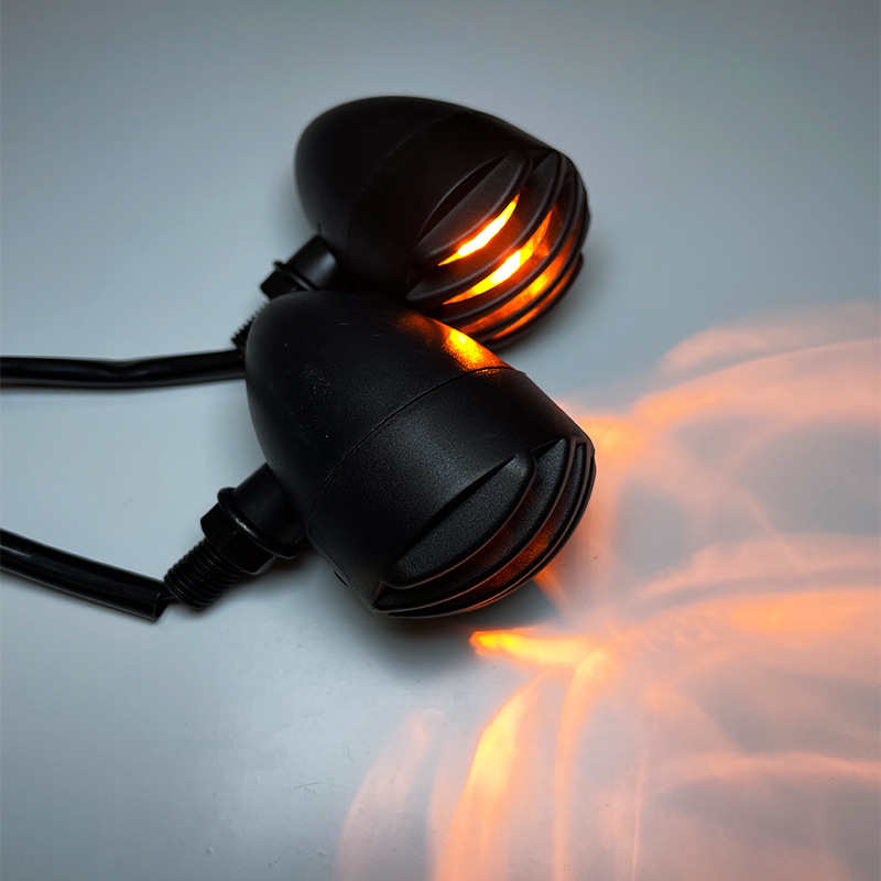 Transfronteriza caliente 125 motocicleta becerro coche eléctrico señal de giro retro Harley modificado Universal luz LED