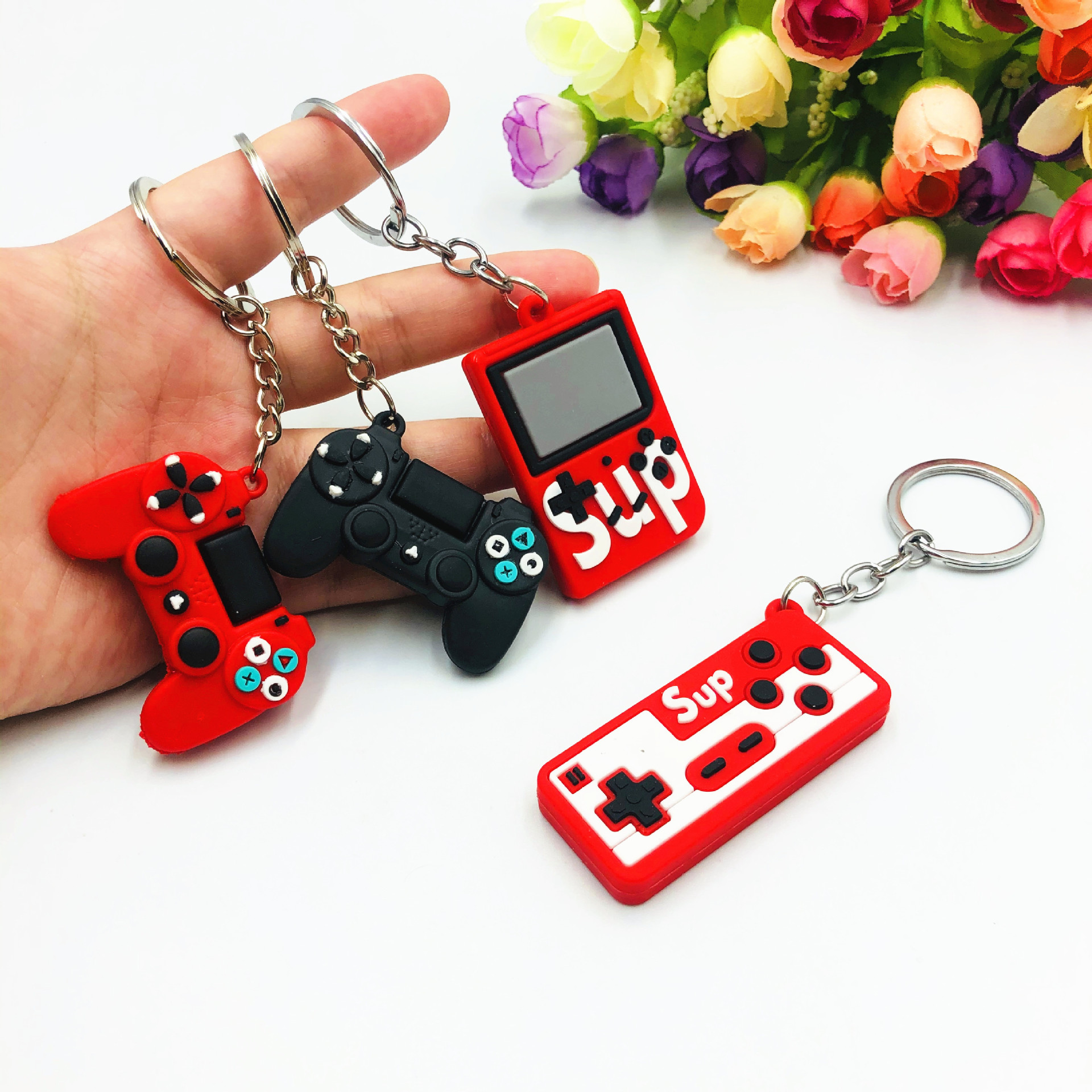 Transfronterizo PVC pegamento flexible simulación creativa máquina de juego a la antigua manija llavero bolso de los niños colgante pequeño regalo