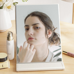 Factory direct sales folding portable high-definition makeup mirror PU leather desktop portable makeup mirror large, medium and small desktop mirror