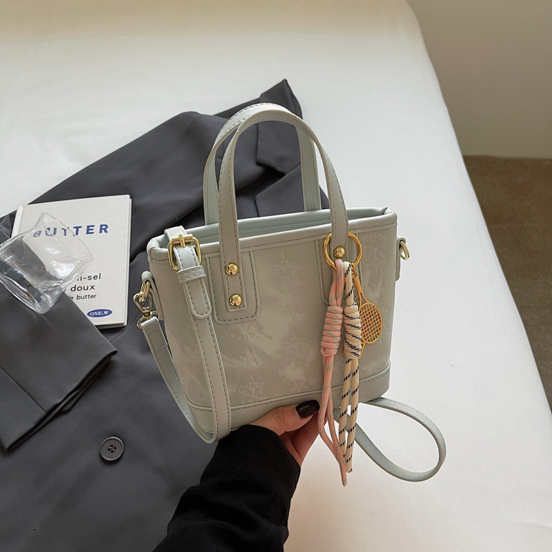 Bolso de mano/bucket bag de moda coreana 2025 para mujer, diseño con relieve, textura de alta gama, versátil, también cruzado