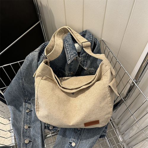 Large-capacity canvas casual bag  summer commuting texture make-up single shoulder crossbody bag this year's popular tote bag