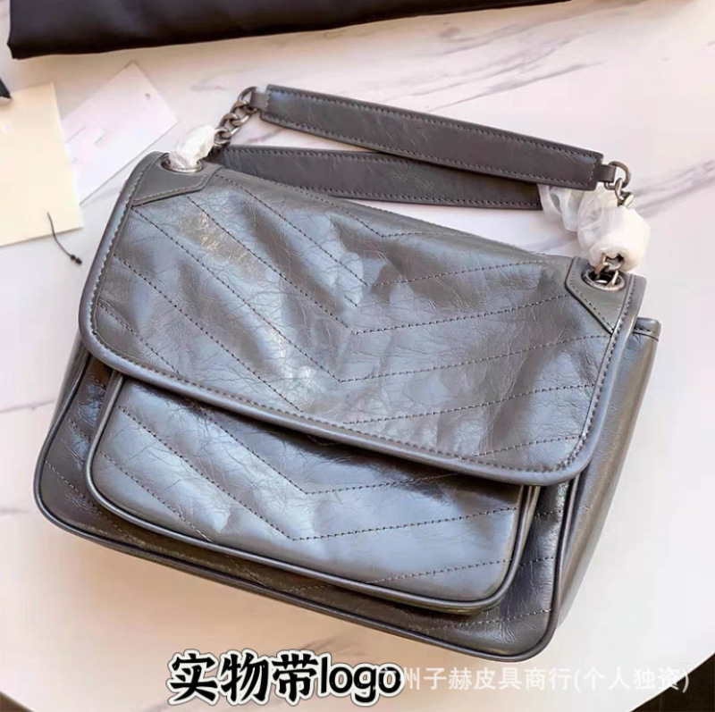 元の工場の高品質の楊林のnikiの中号の郵便番号は本革のチェーンの放浪のカバンを包んで肩を斜めに掛けてわきの下の女性のカバンを掛けます。|undefined