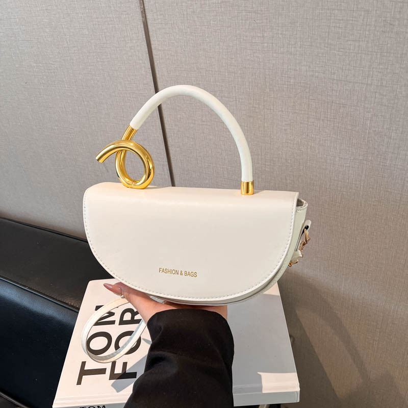 Diseño de alta calidad bolsos de mano bolsos de mujer sensación retro nicho silla transfronteriza estilo simple nueva bolsa universal