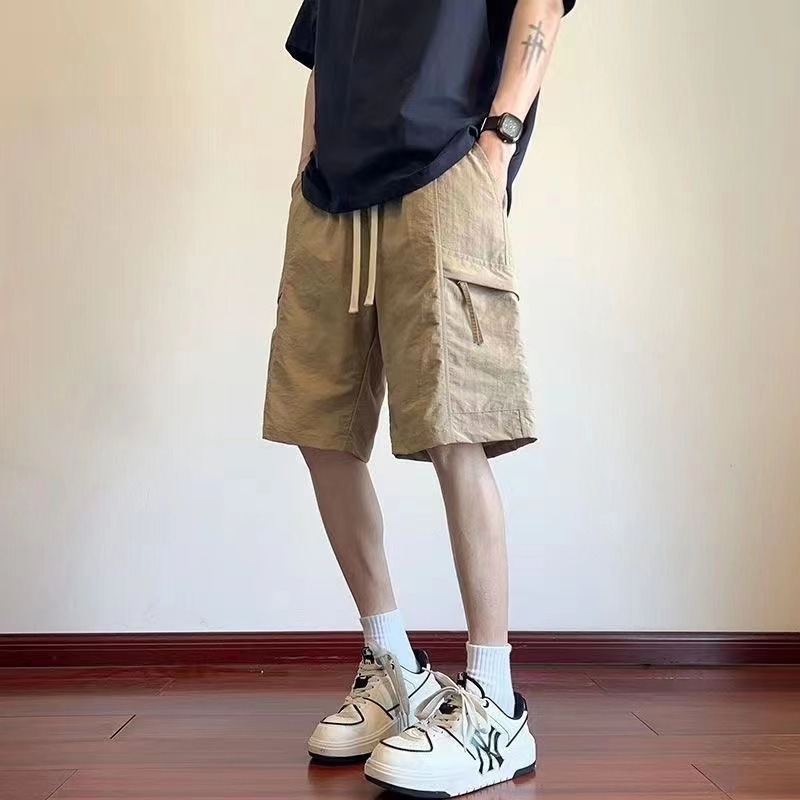 2025 nuevos pantalones deportivos con hielo universal cinco pantalones casuales de moda pantalones cortos de trabajo para hombres de verano delgados
