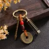 Nine-story pagoda + gold medal inscription pen + yellow rope Five Emperors Coin