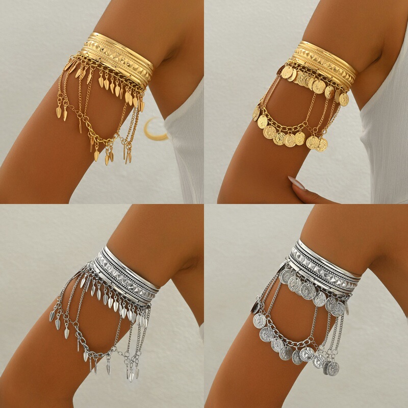 Europe and the United States cross-border metal wind tassel arm chain personality retro disc head feather pendant arm bracelet Middle East accessories