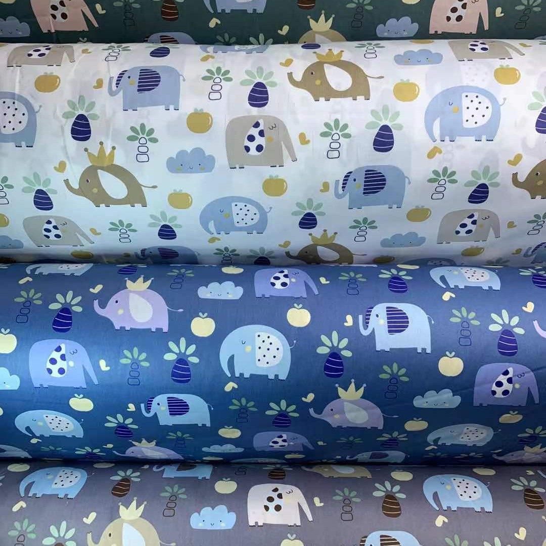 现货斜纹纯棉布料批发 可爱卡通 童装面料 睡袋罩衣布料 鞋帽布料