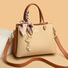 袋鼠2024新款手提包女通勤风简约实用大容量三层袋口软皮包单肩包