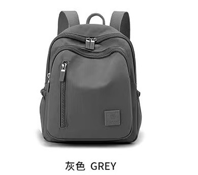 Mochila sencilla e informal para mujer, bolso portátil de gran capacidad para viajes y desplazamientos, mochila versátil de tela de nailon de gran capacidad para mujer