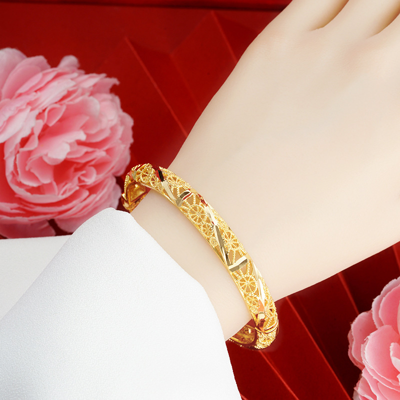 Hueco cloisonne pulsera Vietnam oro hombres y mujeres hebilla pulsera estilo chino imitación oro no desvanecimiento fábrica suministro al por mayor