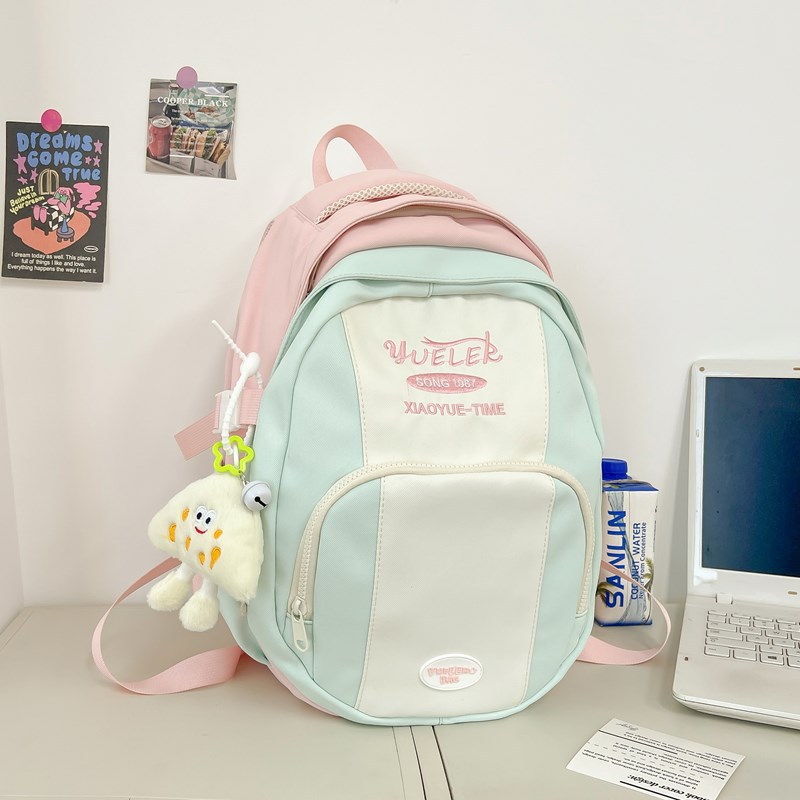 High-value ins-style niche contrast backpack tide junior high school Senior high school college students schoolbag female travel backpack wholesale