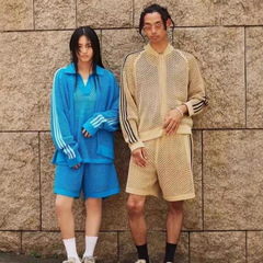 クロスボーダーの新しい共同ブランドの中空メッシュショーツ、ハンサムなスタイルの二層カジュアルスーツ、男性と女性のカップルの同じスタイルのトレンディなショーツ