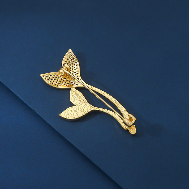 Designer style, personalized fishtail brooch, female high-end feeling, niche inlaid zircon corsage, paired with light luxury suit clothing_voghion.com