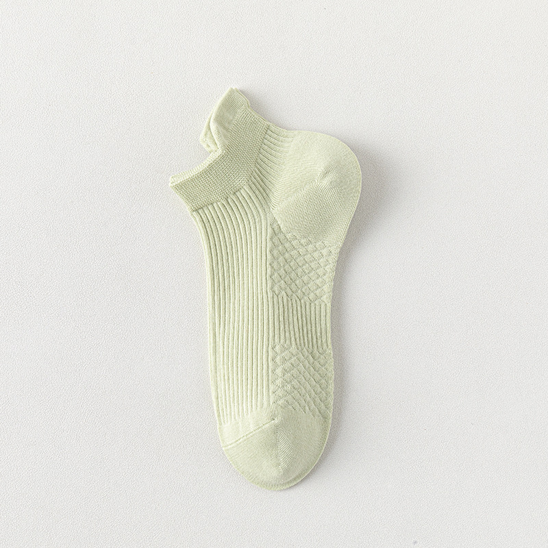 Calcetines de barco para mujeres, calcetines de primavera y verano, calcetines de algodón de color sólido, calcetines de algodón resistentes a las bolas, calcetines de embalaje independientes sin costuras.