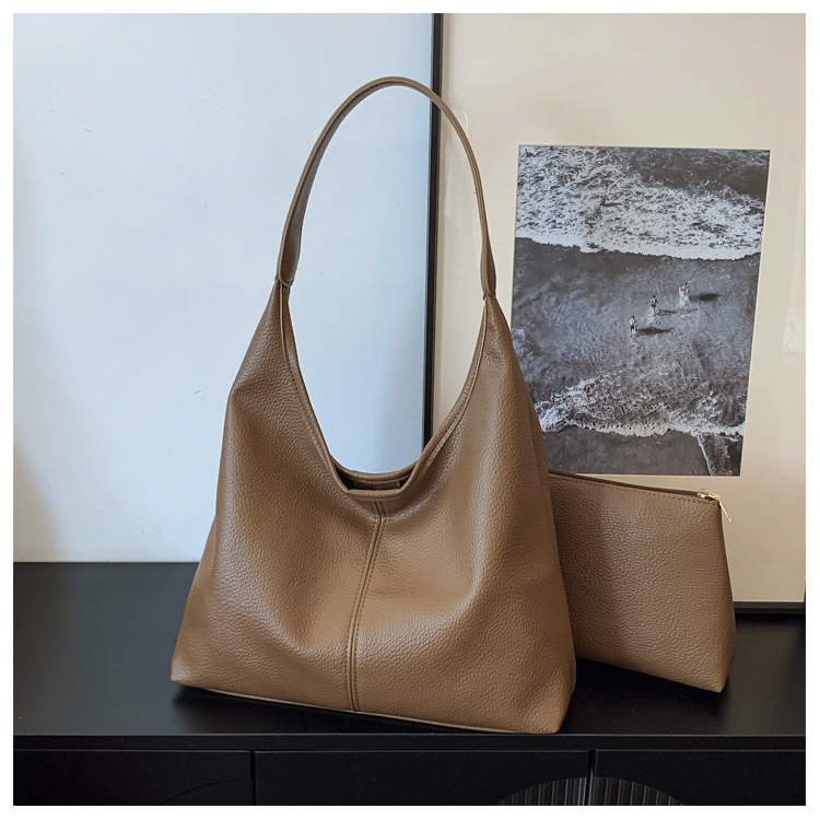 Bolso de cubo portátil de sentido avanzado transfronterizo Bolso de hombro de moda de todo fósforo retro femenino Bolso de viaje de gran capacidad casual