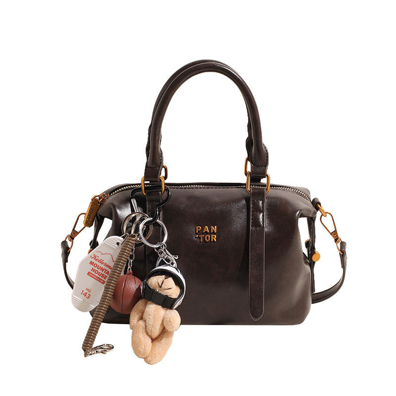 Bolso de almohada de moda de mano, bolso de hombro de alta calidad coreano, bolso de nicho de invierno de 2024 para mujeres simples