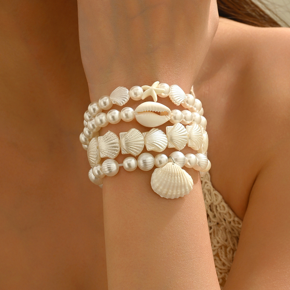 Bracciale elegante da donna con perle e conchiglie naturali_voghion.com