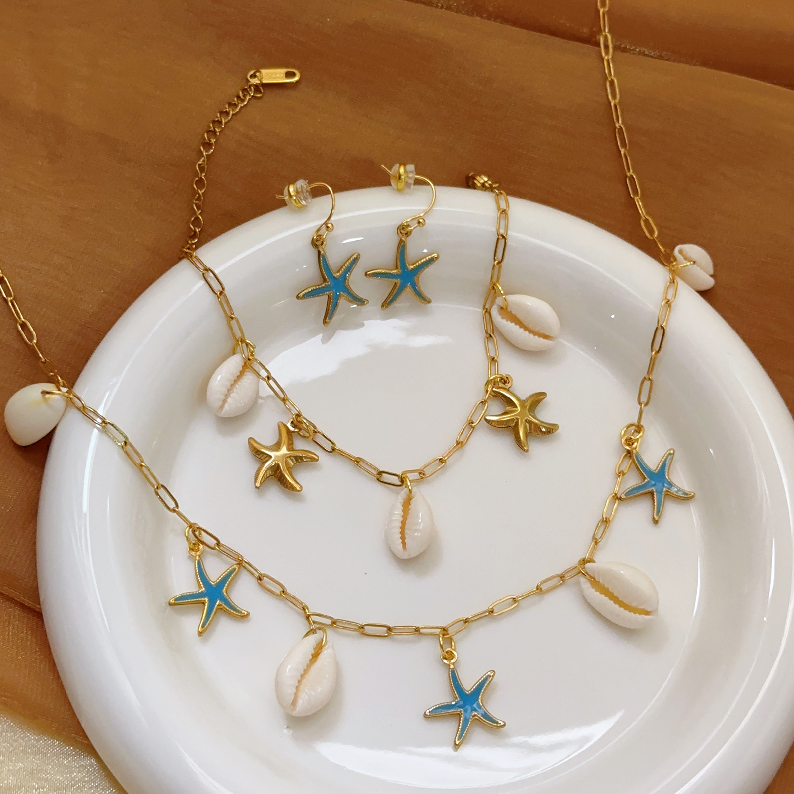 Europeo y americano transfronterizo nuevo estilo concha estrella de mar collar femenino estilo océano vacaciones moda joyería de todo fósforo concha acero inoxidable