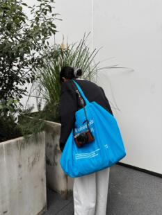 Small design capacious blue shopping bag, one-shoulder bag