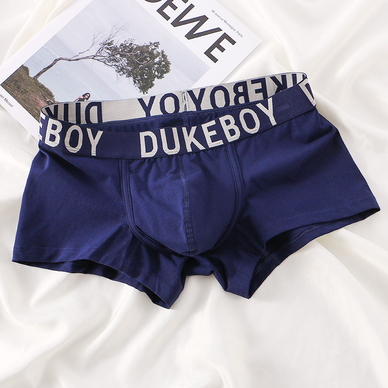 Ropa interior de hombre de gama alta hilo de algodón transpirable cómodo boxeadores simples U convexa bolsa grande Mediados de cintura Boxer pantalones cortos pantalones de cabeza