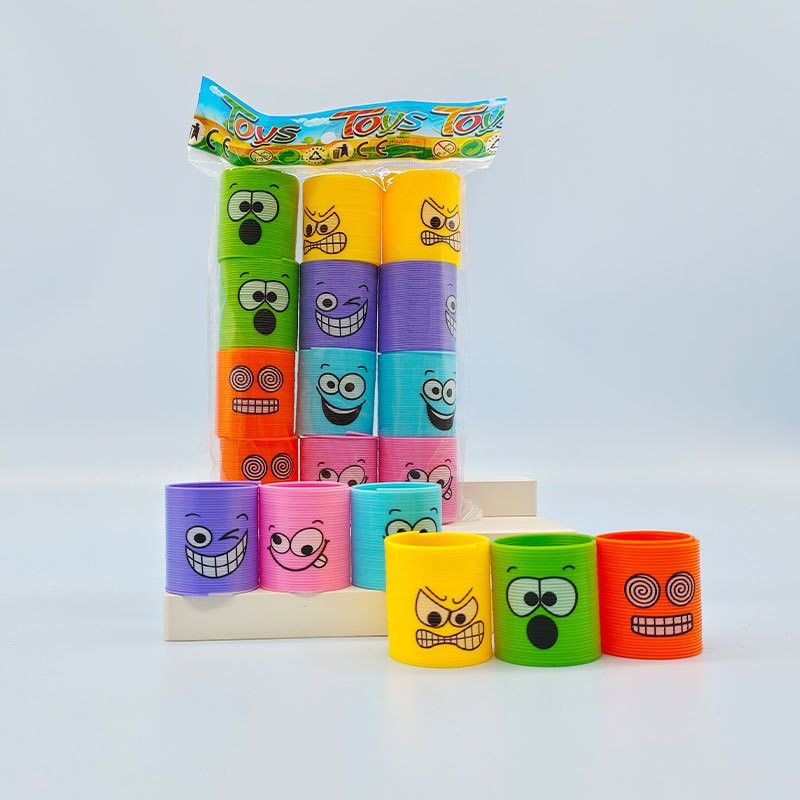 Regalo de trompeta de anillo de primavera de venta caliente transfronteriza, rompecabezas, nostalgia, sonrisas sonrientes apiladas, música mágica círculo del arco iris