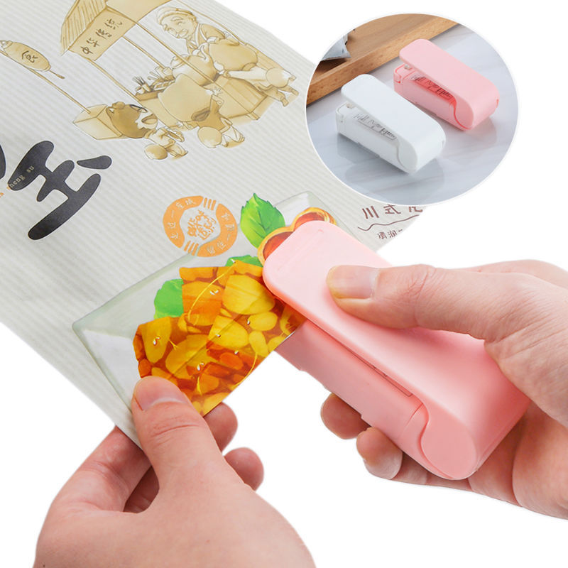 Hot Portable Mini Sealing Machine Plastic Sealing Machine Snack Plastic Bag Sealing Machine Household Hand Pressure Heat Sealing Machine Artifact display picture 1