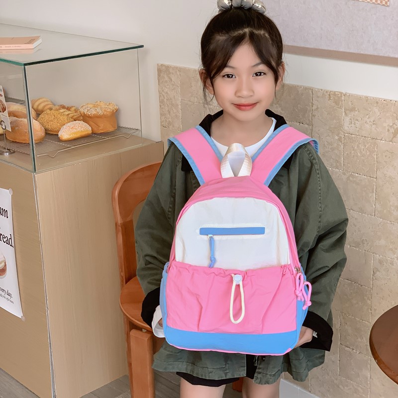 Mochila de estudiantes de escuela primaria de gran capacidad, moda coreana, mochila para niños y niñas, nueva mochila para niños de comercio exterior transfronterizo.