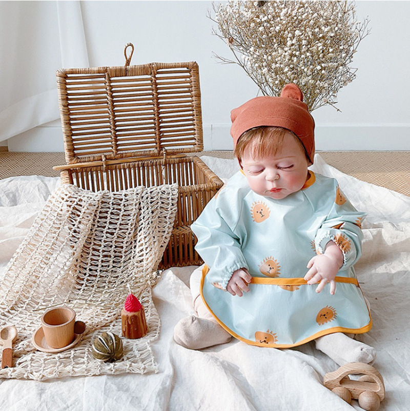 INS nuevo estilo coreano bata de manga larga impermeable comer ropa de alimentación del bebé babero niños TPU reverso vestir babero del bebé