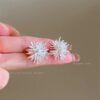 11 # Silver fireworks diamond mosquito coil ear clip