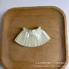 White pleated skirt