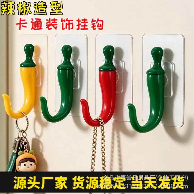 Cartoon cute chili-shaped hook, strong adhesive hook, no need to drill holes, for hanging keys behind the entrance door or in the hallway Cartoon cute chili-shaped hook, strong adhesive hook, no need to drill holes, for hanging keys behind the entrance door or in the hallway