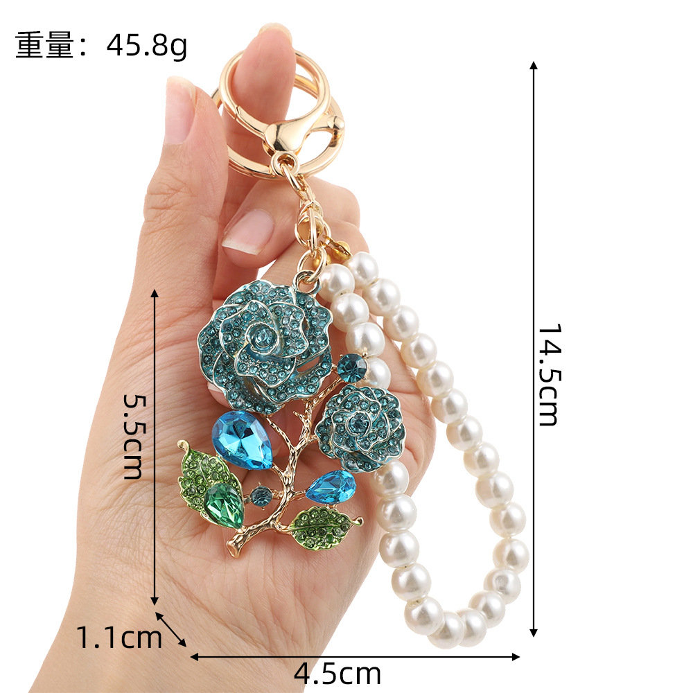 Porte-clés de luxe fleur de rose avec pendentif sac en diamants_voghion.com
