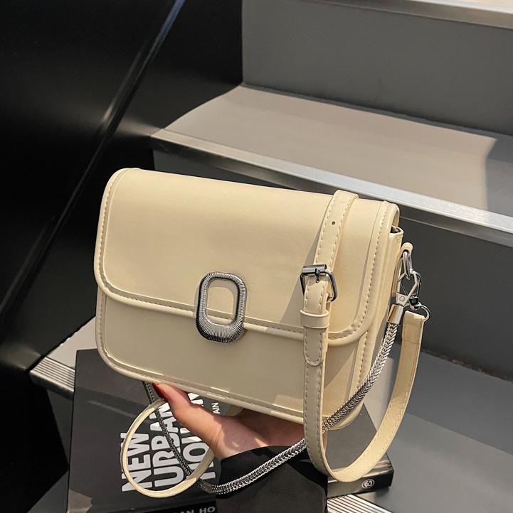 Textura salvaje popular super fuego pequeño bolso cuadrado 2025 nuevo bolso femenino simple viajero casual estilo occidental bolso de mensajero de un solo hombro