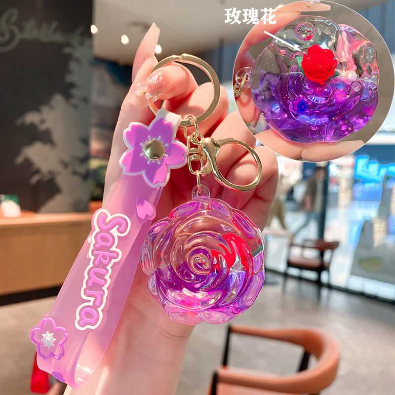 Iteret Celebrity Oil Doll Liquid Sad Bottle Keychai For Wome Exquisite Cute Cartoo Rose Pedat Backpack_voghion.com