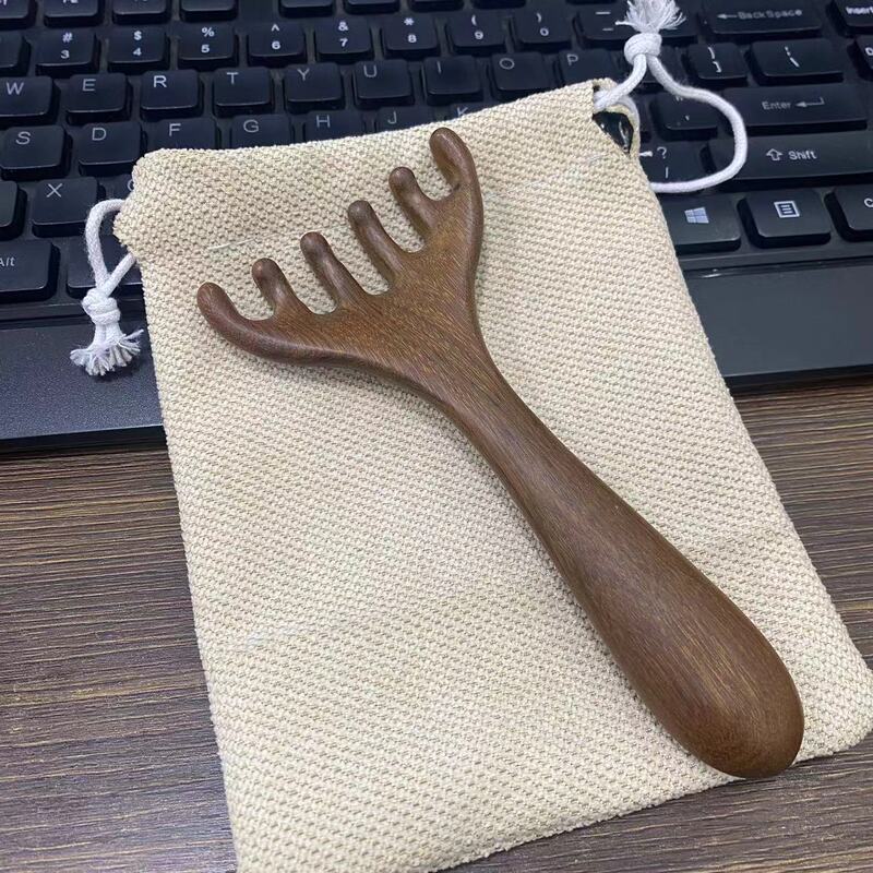 鹿の角の頭部の経絡のマッサージ器のマッサージ器は頭をつかんで治療します。|undefined