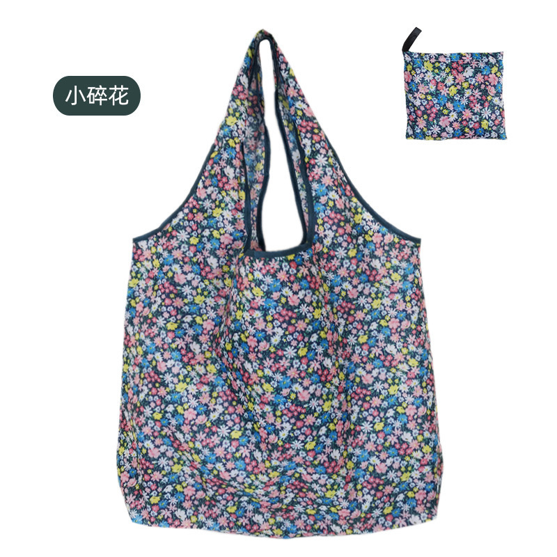 Spot bolsa de compras plegable de gran capacidad Spot bolsa de protección ambiental bolsa plegable bolsa de almacenamiento portátil impresa portátil creativa